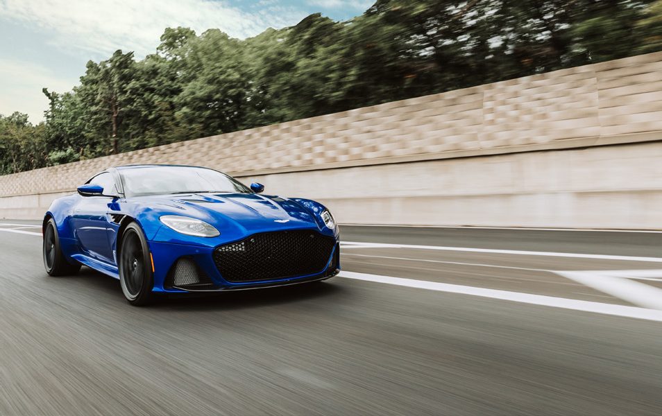A blue supercar on a race track